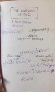 This page from my journal is a precious artifact from the trip. Here you see the hand of three different Haitians trying to help me translate. 